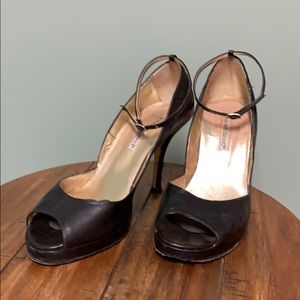 Black leather ankle strap heels